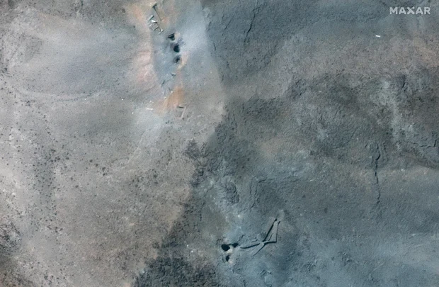 [Image: 07-after-airstrikes-close-up-view-of-hol...5-ge1.webp]